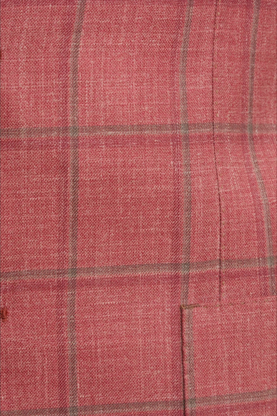 Close-up of red fabric with a checkered pattern