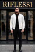 Sartorio Cashmere-Beaver Lined Bomber — Ivory worn open by the model in front of the Riflessi store