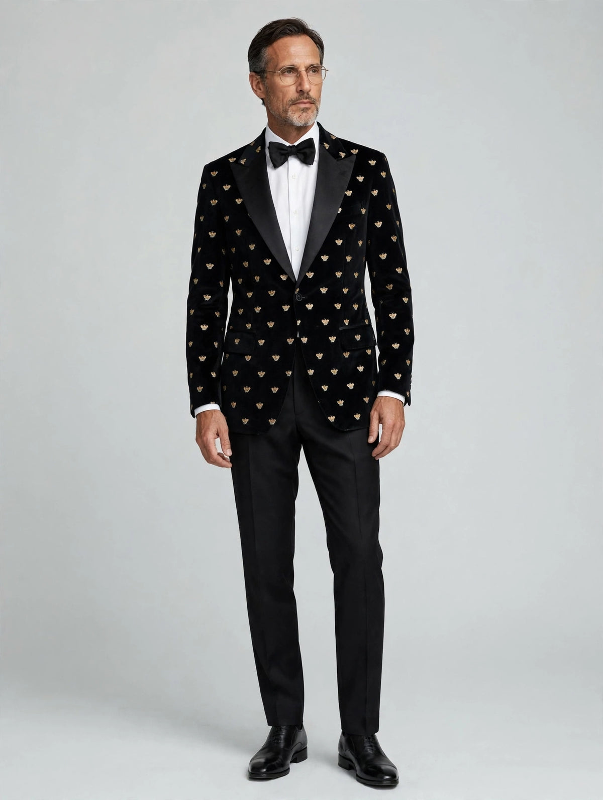 Sartorio black and gold bee cotton tuxedo jacket on the model, studio