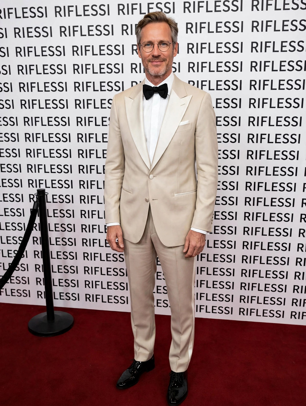 Sartorio beige virgin wool tuxedo on the model at the Riflessi wall