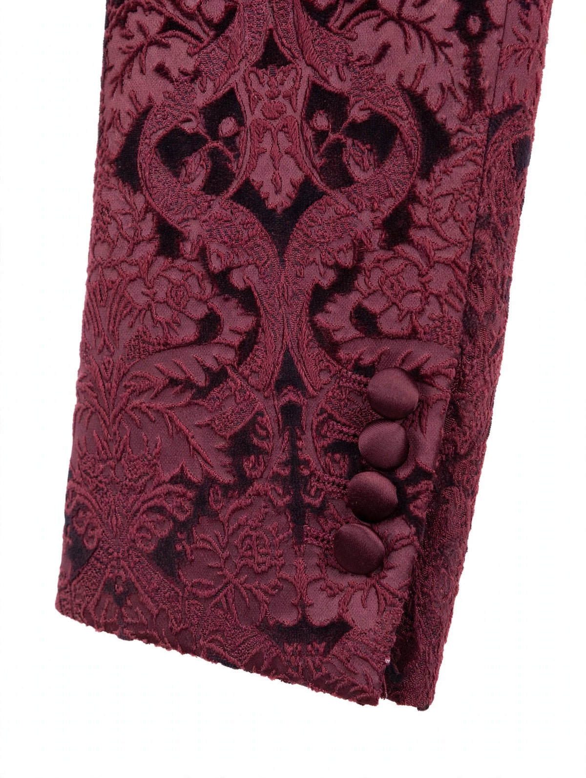 Satin-covered cuff buttons detail