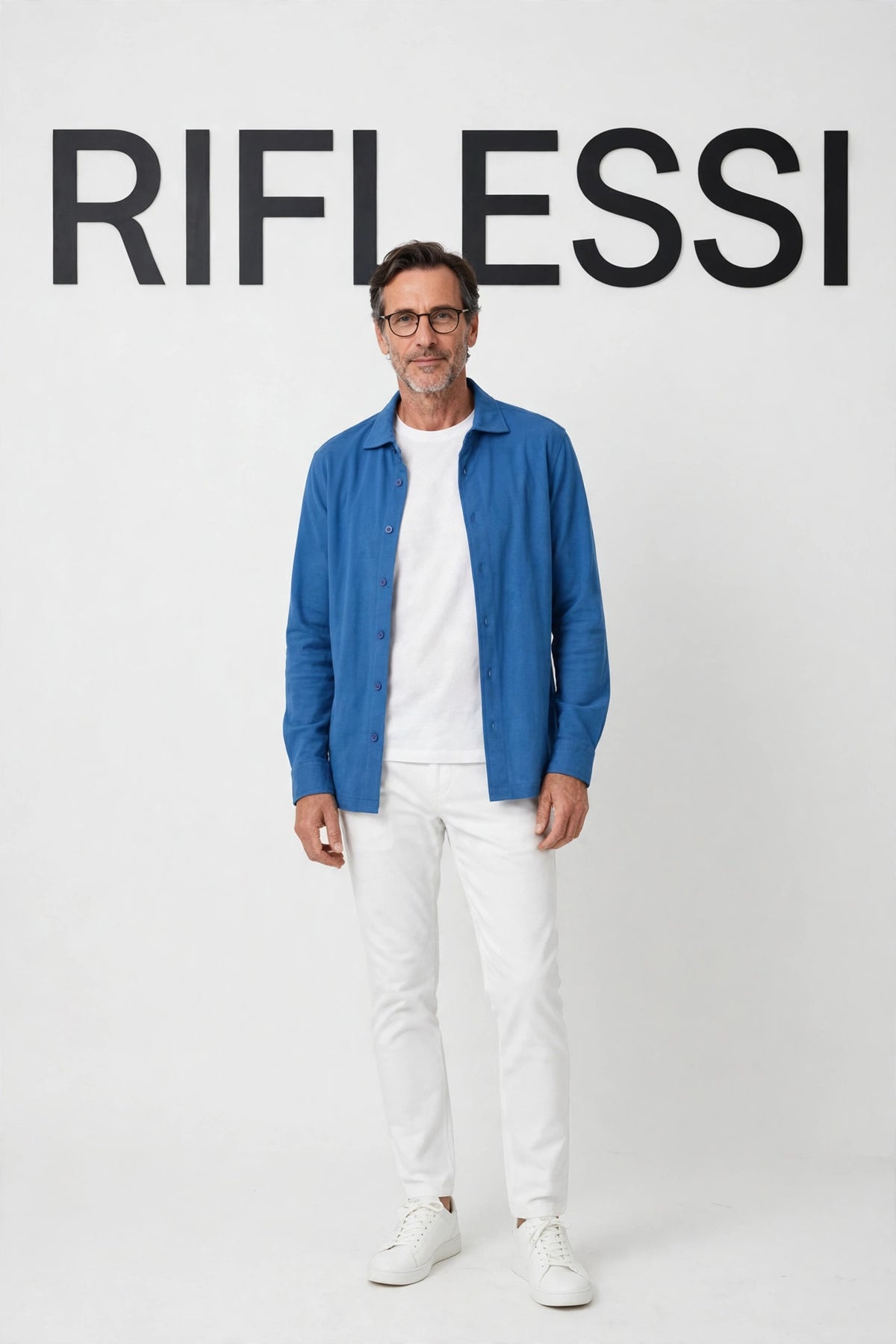 Kired CAPRI polo worn open as overshirt on model, front
