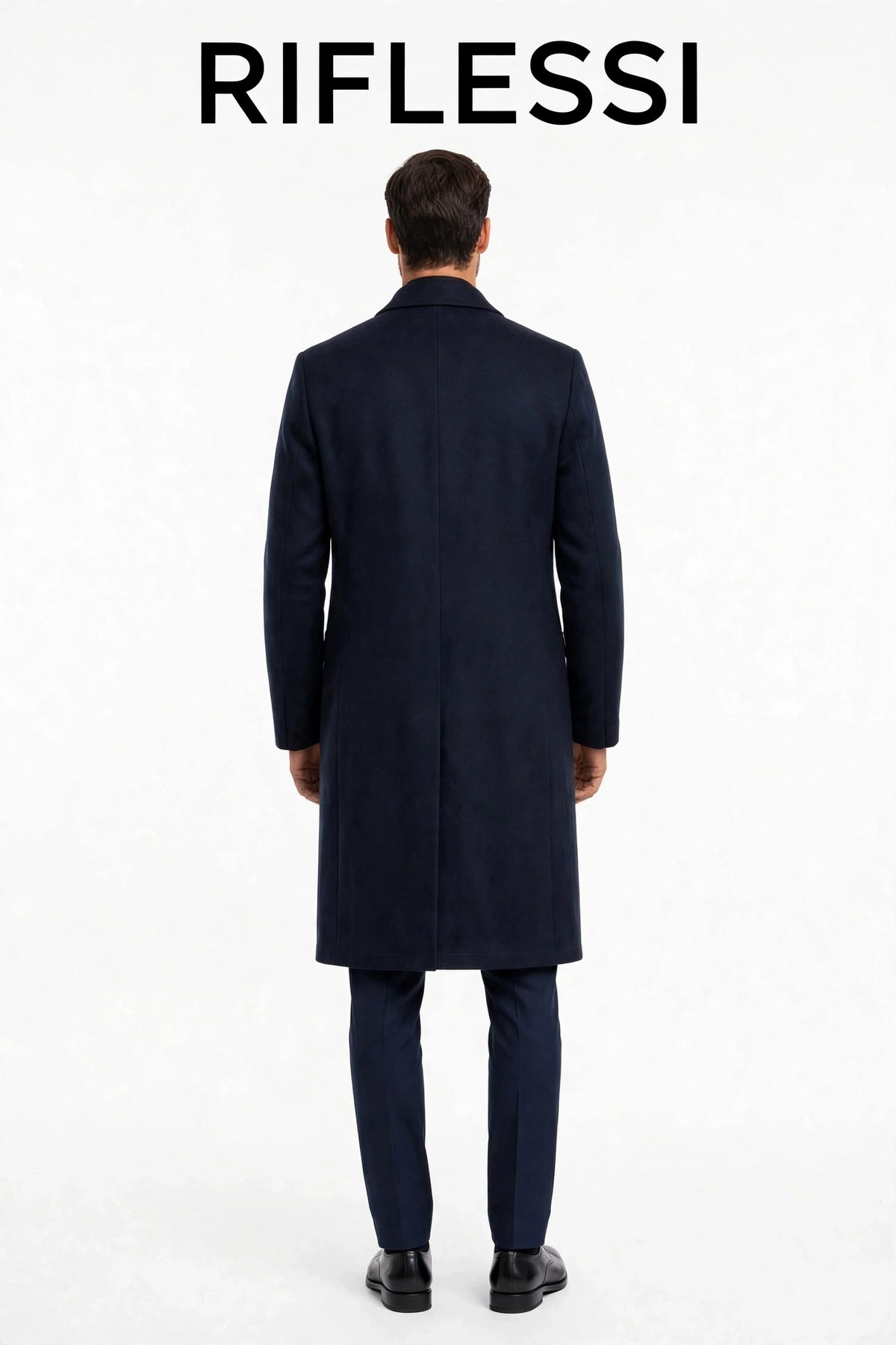 Kired reversible cashmere coat worn by model, back