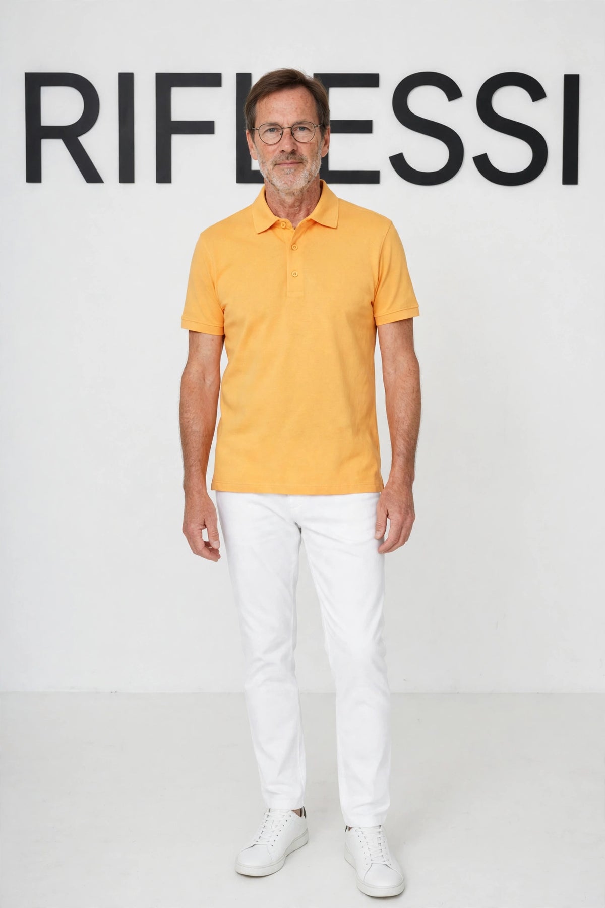 Kired POSI polo yellow orange on model, front