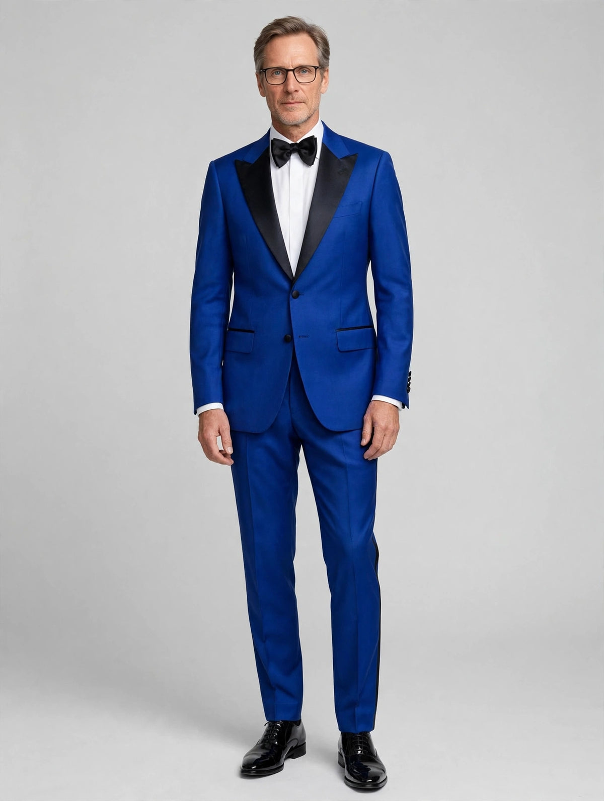 Sartorio royal blue virgin wool tuxedo on the model, studio