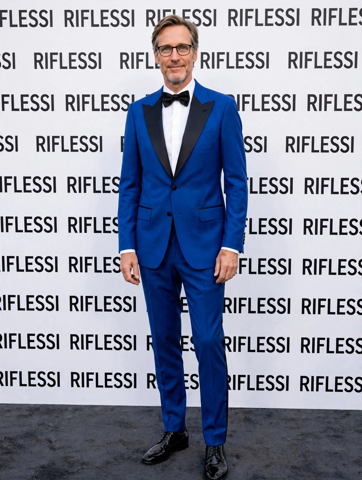 Sartorio royal blue virgin wool tuxedo on the model at the Riflessi wall