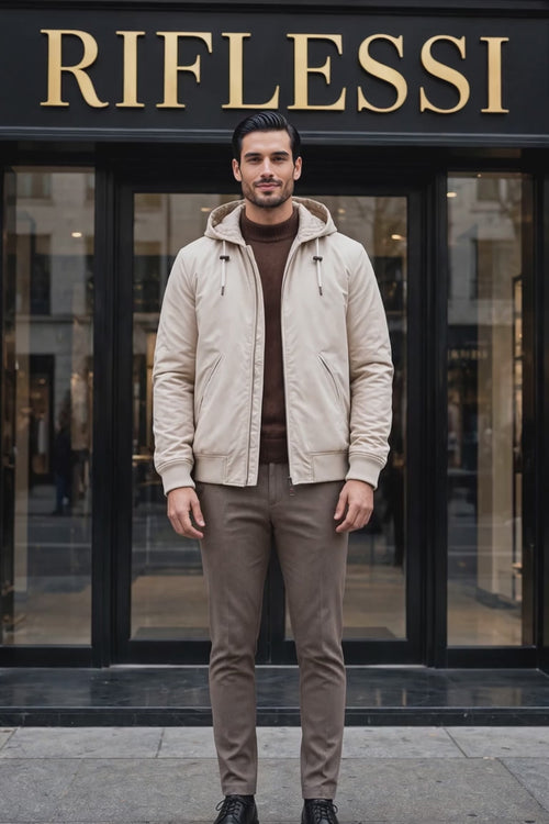Kired Barwa Prince of Wales reversible jacket — beige rain side turns to cashmere check side at the Riflessi entrance